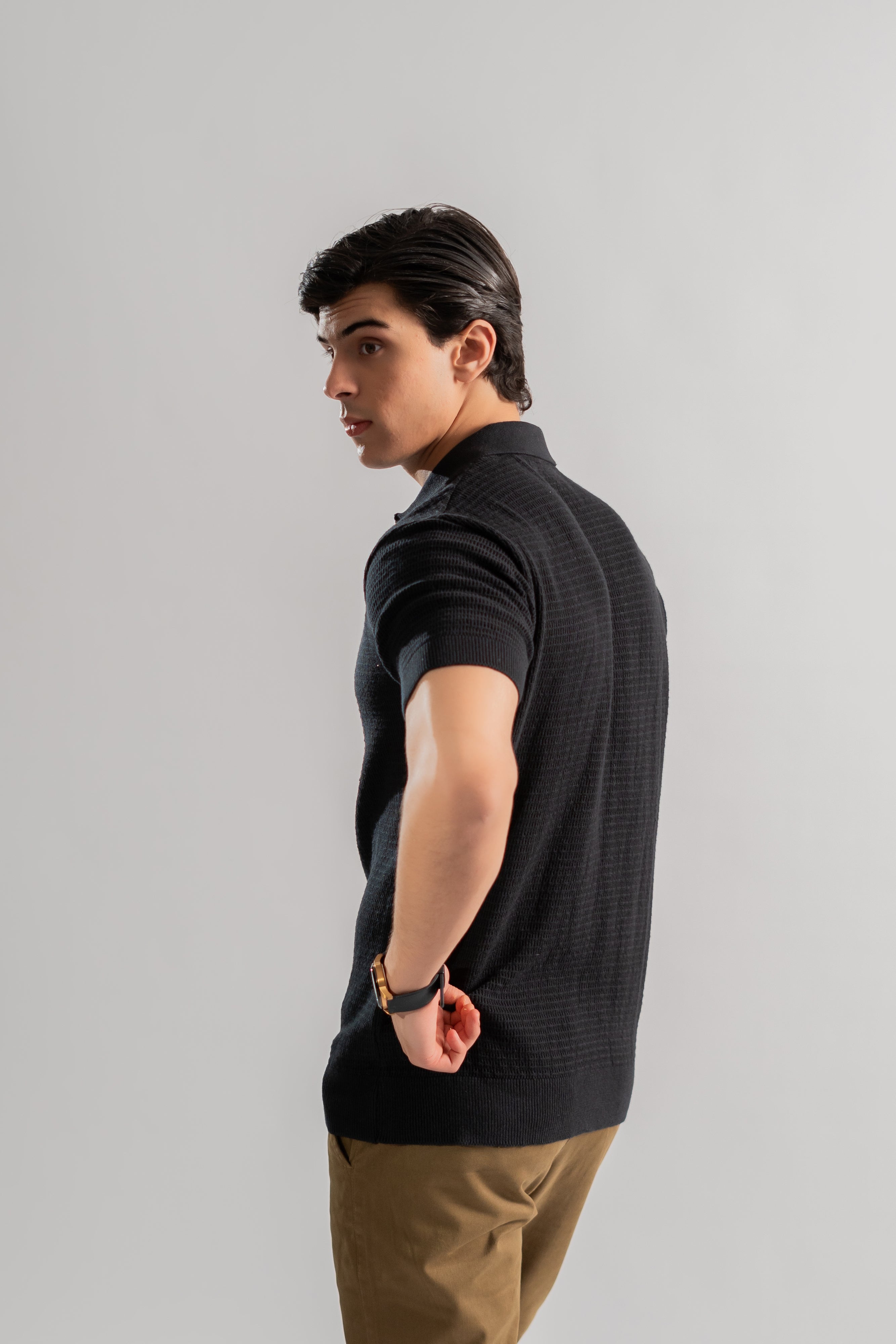 Black textured knit polo