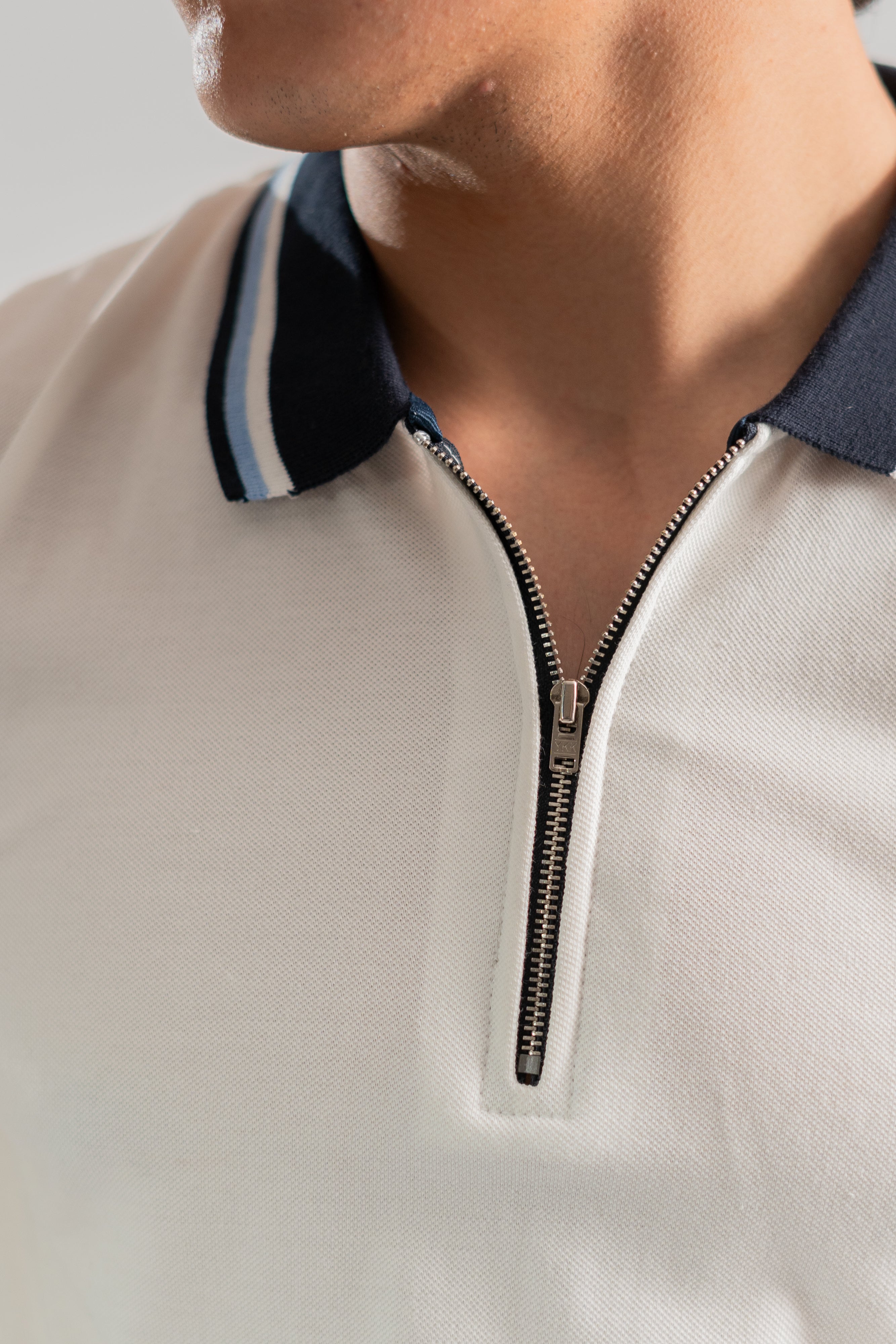 White zipper polo